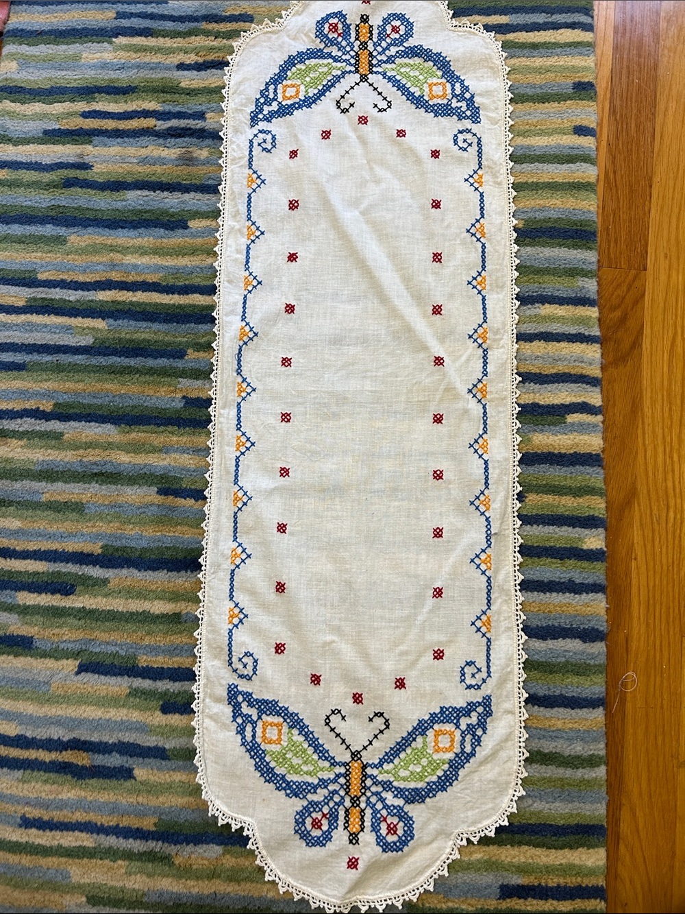 Hand cross stitched dresser scarf. 44 in. Nice border. Cotton. No stains. Retro!